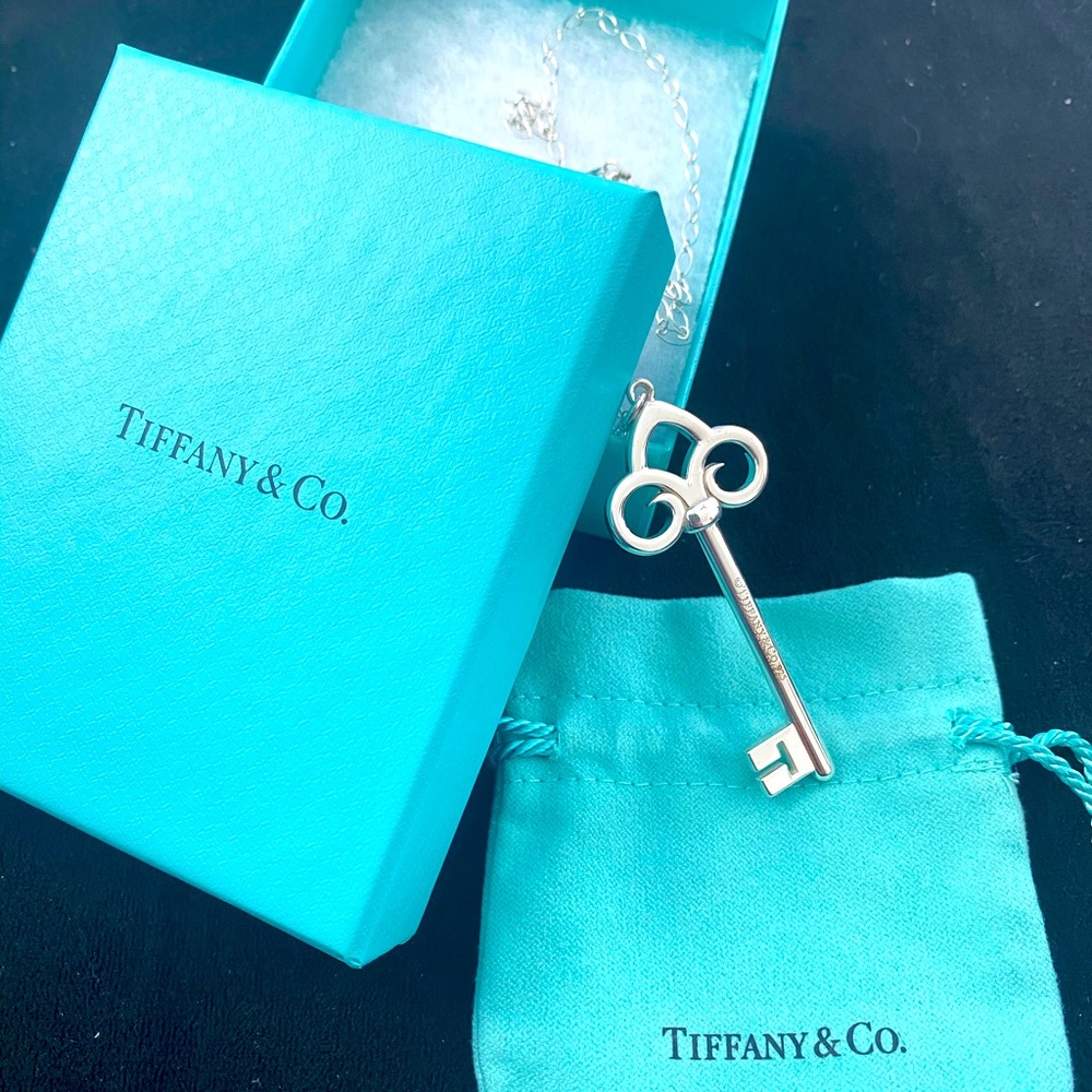 Tiffany & Co. Fleur de lis key pendent.